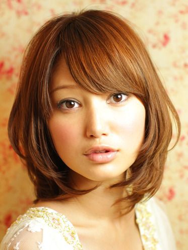 Medium length hair with bangs for round faces medium-length-hair-with-bangs-for-round-faces-12_13