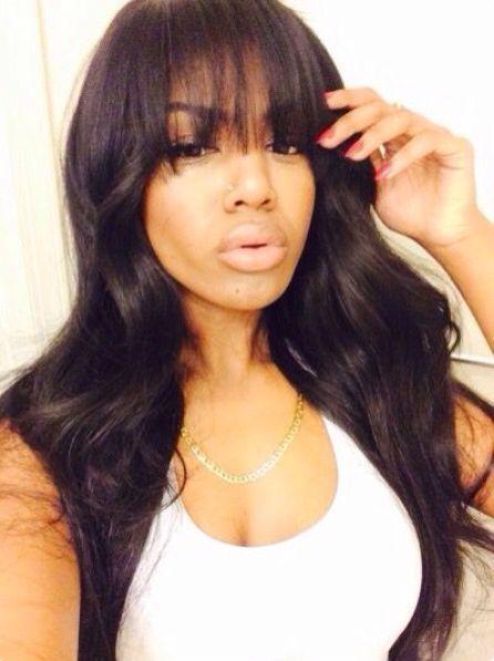 Black weave with bangs