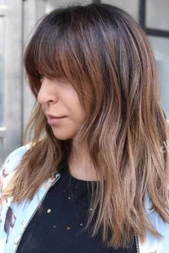 Layered cut with bangs